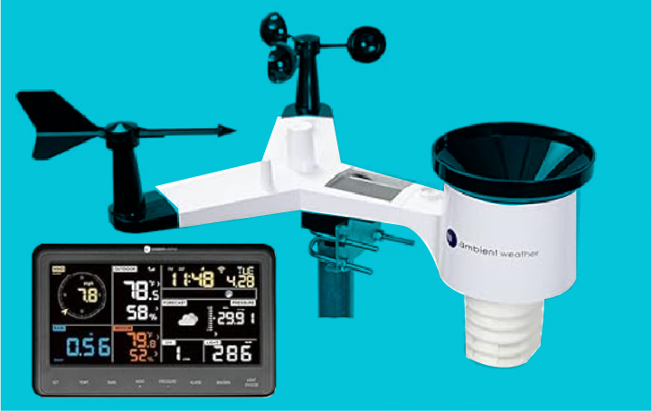 Weather station with a wind vane, wind cups, rain collector and an indoor display console